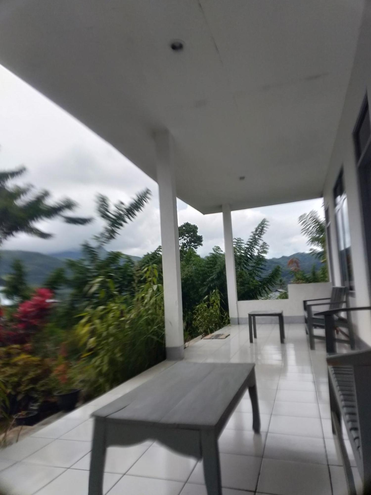 Hidayah Homestay Kelimutu Phòng bức ảnh